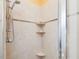 Shower features tile walls, a shower head and built in shelves at 201 W Park Dr, Raleigh, NC 27605