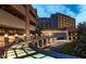 A building exterior with a skybridge and well-lit walkway and landscaped greenery at 2013 Trident Maple Ln, Chapel Hill, NC 27517