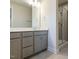 Bathroom with a large mirror and a tiled glass shower at 2019 Trident Maple Ln, Chapel Hill, NC 27517