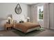 Well-lit bedroom with a large window, neutral decor, and stylish bedside lamps at 2019 Trident Maple Ln, Chapel Hill, NC 27517