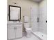 Modern bathroom with sleek vanity, glass-enclosed shower, and minimalist fixtures at 2021 Trident Maple Ln, Chapel Hill, NC 27517