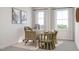 Bright home office with a modern desk, comfortable seating, and natural light at 2021 Trident Maple Ln, Chapel Hill, NC 27517