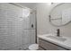 Bathroom featuring modern shower, vanity with stone counter, and updated fixtures at 2607 Nation Ave, Durham, NC 27707