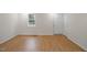 Well lit bedroom featuring wood floors at 2607 Nation Ave, Durham, NC 27707