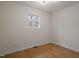 Empty room featuring wood floors and a picture window at 2607 Nation Ave, Durham, NC 27707