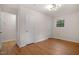 Cozy bedroom with hardwood floors and modern lighting fixtures at 2607 Nation Ave, Durham, NC 27707