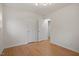 Bedroom with hardwood floors, large closet, and well lit with modern fixture at 2607 Nation Ave, Durham, NC 27707