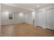 Spacious living room featuring light wood floors and white trim at 2607 Nation Ave, Durham, NC 27707