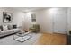 Bright living room with stylish furniture, hardwood floors, and natural light at 2607 Nation Ave, Durham, NC 27707