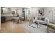 Open-concept space with dining area, stainless appliances, and modern living room at 2607 Nation Ave, Durham, NC 27707