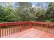 Outdoor deck painted red, perfect for relaxing with a view of the backyard at 270 S Ridge Dr, Garner, NC 27529