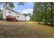 Expansive backyard with a charming deck, perfect for outdoor entertaining and relaxation at 270 S Ridge Dr, Garner, NC 27529