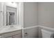 Well-lit bathroom with a vanity and mirror at 270 S Ridge Dr, Garner, NC 27529
