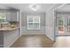 Dining area with a window and hardwood floors at 270 S Ridge Dr, Garner, NC 27529