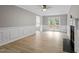 Spacious living room with a ceiling fan, fireplace and wood flooring at 270 S Ridge Dr, Garner, NC 27529