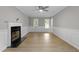 Bright living room with a fireplace and wood flooring at 270 S Ridge Dr, Garner, NC 27529