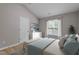 Relaxing main bedroom with a vaulted ceiling, a dresser and a comfortable bed at 270 S Ridge Dr, Garner, NC 27529