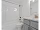 Bathroom with a tub and shower combination and a grey vanity at 3 Duxford Ct, Durham, NC 27703