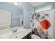 Bathroom featuring a large sink, big mirror, and natural light coming through the window at 303 Bella Sq, Smithfield, NC 27577