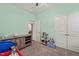 Comfortable carpeted bedroom with lots of storage and natural light from a window at 303 Bella Sq, Smithfield, NC 27577