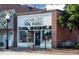 Charming Chatham Street Wine Market facade with a welcoming storefront display and vintage street lighting at 2900 Kempthorne Rd # 57, Cary, NC 27519