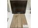 Display of cabinet and luxury vinyl flooring samples at 319 Chesapeake Commons St # 103, Garner, NC 27529