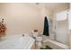 Relaxing bathroom with a jetted tub, shower, and toilet against a neutral backdrop at 3322 Wellington Ridge Loop, Cary, NC 27518