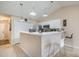 Charming kitchen with stainless steel appliances, pendant lights, and a breakfast bar at 3322 Wellington Ridge Loop, Cary, NC 27518