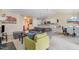 Open-concept living room connects to the kitchen with bar seating and stylish decor at 3322 Wellington Ridge Loop, Cary, NC 27518