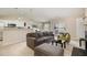 Inviting living space with views of the kitchen, dining, and an open living room at 3322 Wellington Ridge Loop, Cary, NC 27518