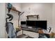 Functional office space with dual monitors, adjustable lighting, and ample desk storage at 3322 Wellington Ridge Loop, Cary, NC 27518