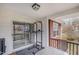 A covered outdoor patio area with sliding glass doors and room for seating at 3322 Wellington Ridge Loop, Cary, NC 27518