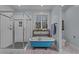 Bright bathroom with a glass-enclosed shower, a clawfoot tub below a window, and attractive finishes and fixtures at 381 Reams Dr, Middlesex, NC 27557