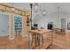 Spacious kitchen adjacent to pantry and featuring an island and rustic fixtures at 381 Reams Dr, Middlesex, NC 27557