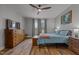 Relaxing main bedroom with hardwood floors, ceiling fan, and view of the countryside at 381 Reams Dr, Middlesex, NC 27557
