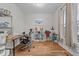 Bright home office with hardwood floors, natural light, and a functional workspace at 381 Reams Dr, Middlesex, NC 27557