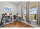 Bright home office with hardwood floors, natural light, and peaceful view outside of the window at 381 Reams Dr, Middlesex, NC 27557