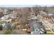 Backyard view highlighting a private deck, mature trees, and well-maintained landscaping in a serene residential setting at 405 N Hyde Park Ave, Durham, NC 27703