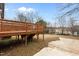 Spacious wooden deck for outdoor entertaining and relaxation in the backyard at 405 N Hyde Park Ave, Durham, NC 27703