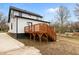 Wooden deck overlooking the backyard in a cozy landscaped yard at 405 N Hyde Park Ave, Durham, NC 27703