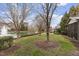 Landscaped pond with a fountain at 414 Travertine Dr, Cary, NC 27519