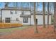 Large backyard featuring a spacious deck with dark metal railings at 4436 Talcott Dr, Durham, NC 27705
