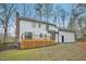 Large backyard with a deck and an open, grassy area at 4436 Talcott Dr, Durham, NC 27705