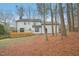 Spacious backyard with a deck and mature trees at 4436 Talcott Dr, Durham, NC 27705