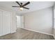 Spacious bedroom with a ceiling fan, closet, contemporary flooring, and adjacent room at 4436 Talcott Dr, Durham, NC 27705