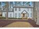 Charming two-story home with a beautifully landscaped front yard and inviting front porch at 4436 Talcott Dr, Durham, NC 27705
