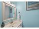 Bathroom with mirror and updated fixtures at 5 Bonham Ct, Durham, NC 27703