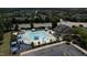 Overhead view of the community pool, clubhouse, playground, and parking lot at 532 Front Ridge Dr, Cary, NC 27519