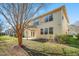 Backyard view of home featuring an open porch and mature tree at 532 Front Ridge Dr, Cary, NC 27519