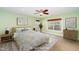 This bedroom is staged with a wooden frame bed, end tables and stylish decor at 532 Front Ridge Dr, Cary, NC 27519